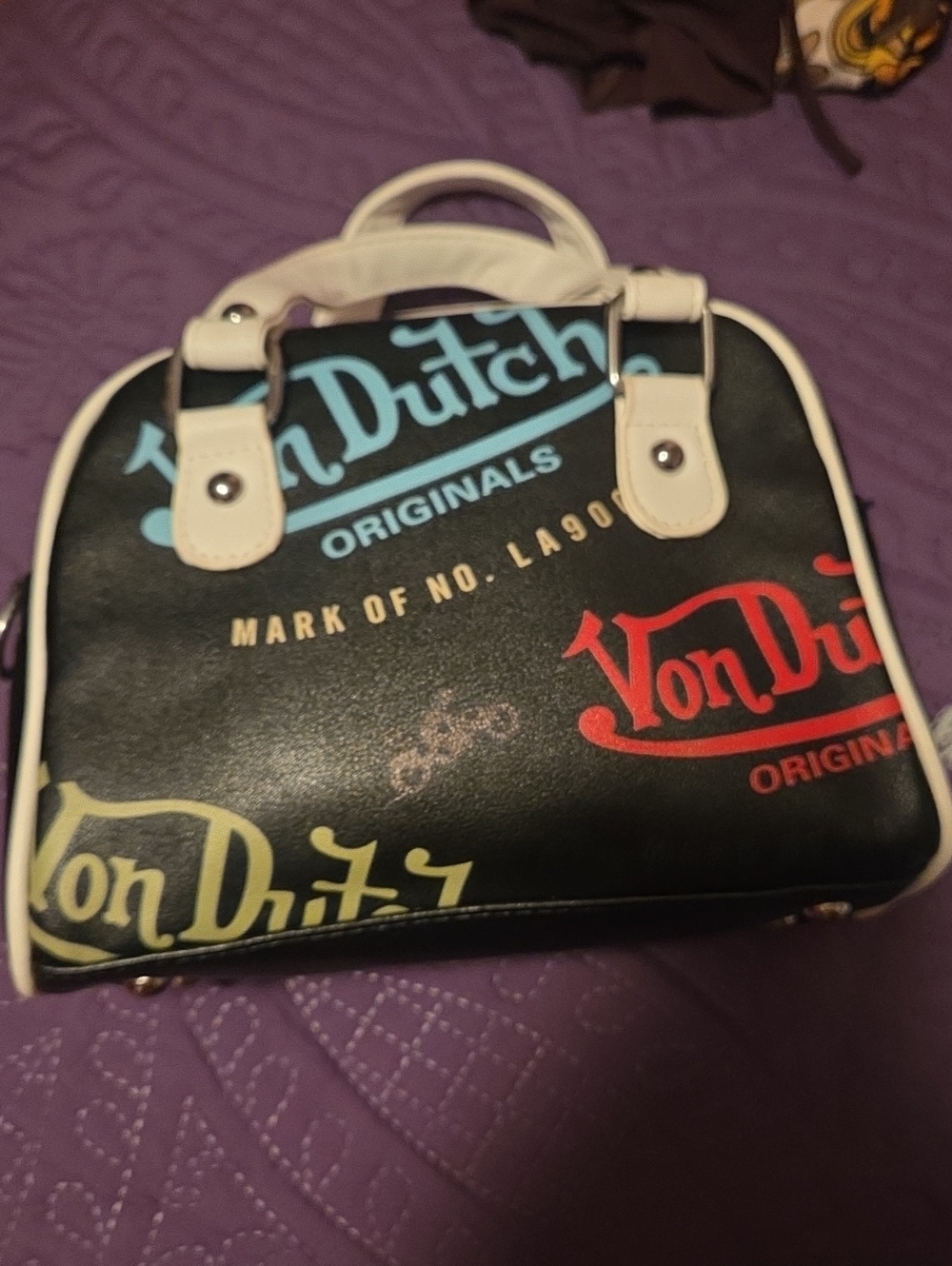 Black Satchel with Red Blue and Yellow Logos